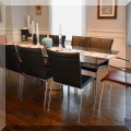 F18. Draenert Furniture Adler Magnum dining table. 29"h x 66"w x 41.5" (includes a leaf) 